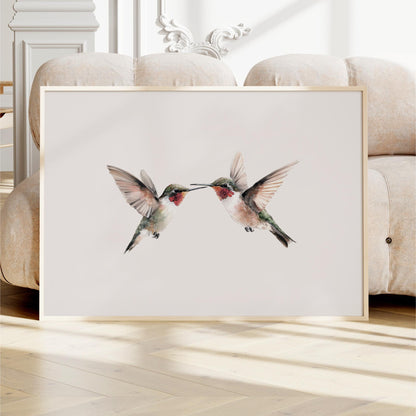 two hummingbirds in flight, with their wings spread wide and their beaks touching, creating a sense of harmony and balance.