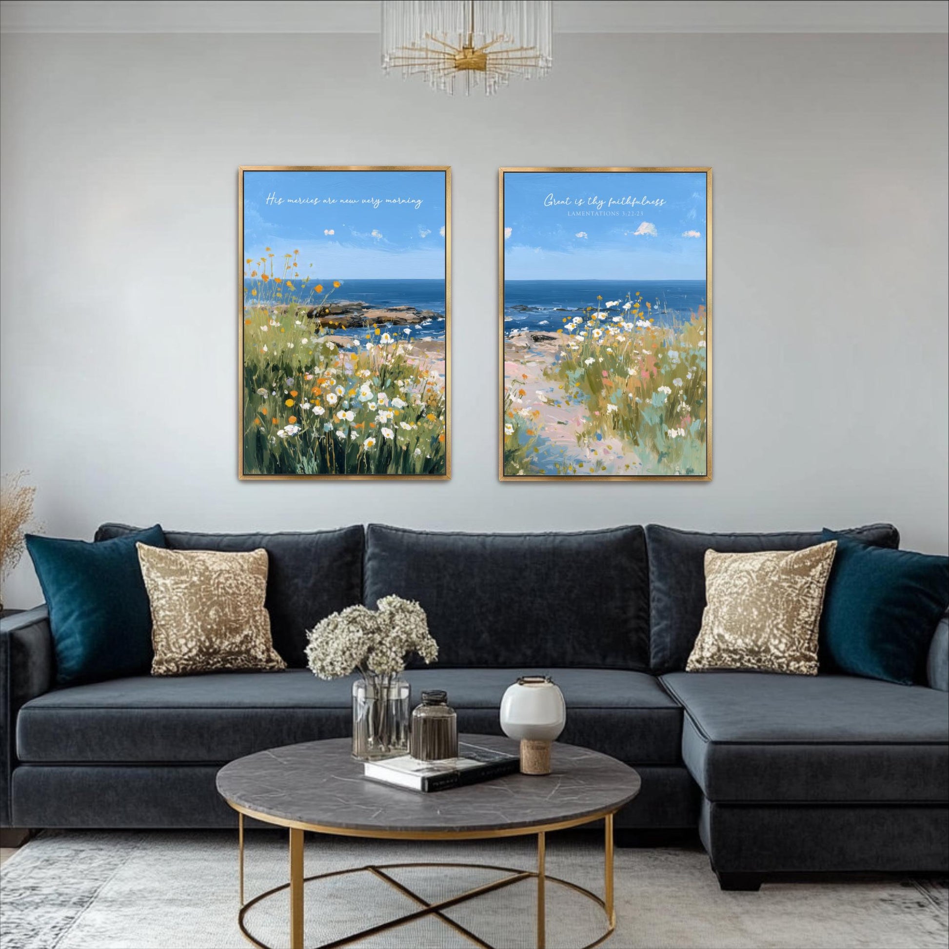 a living room with a black sectional sofa, a round coffee table, and two framed paintings of a beach scene hanging on the wall above the sofa.