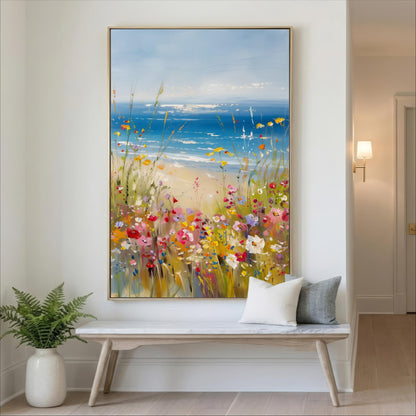 a large painting of a vibrant field of flowers hanging on a wall, with a bench in front of it.