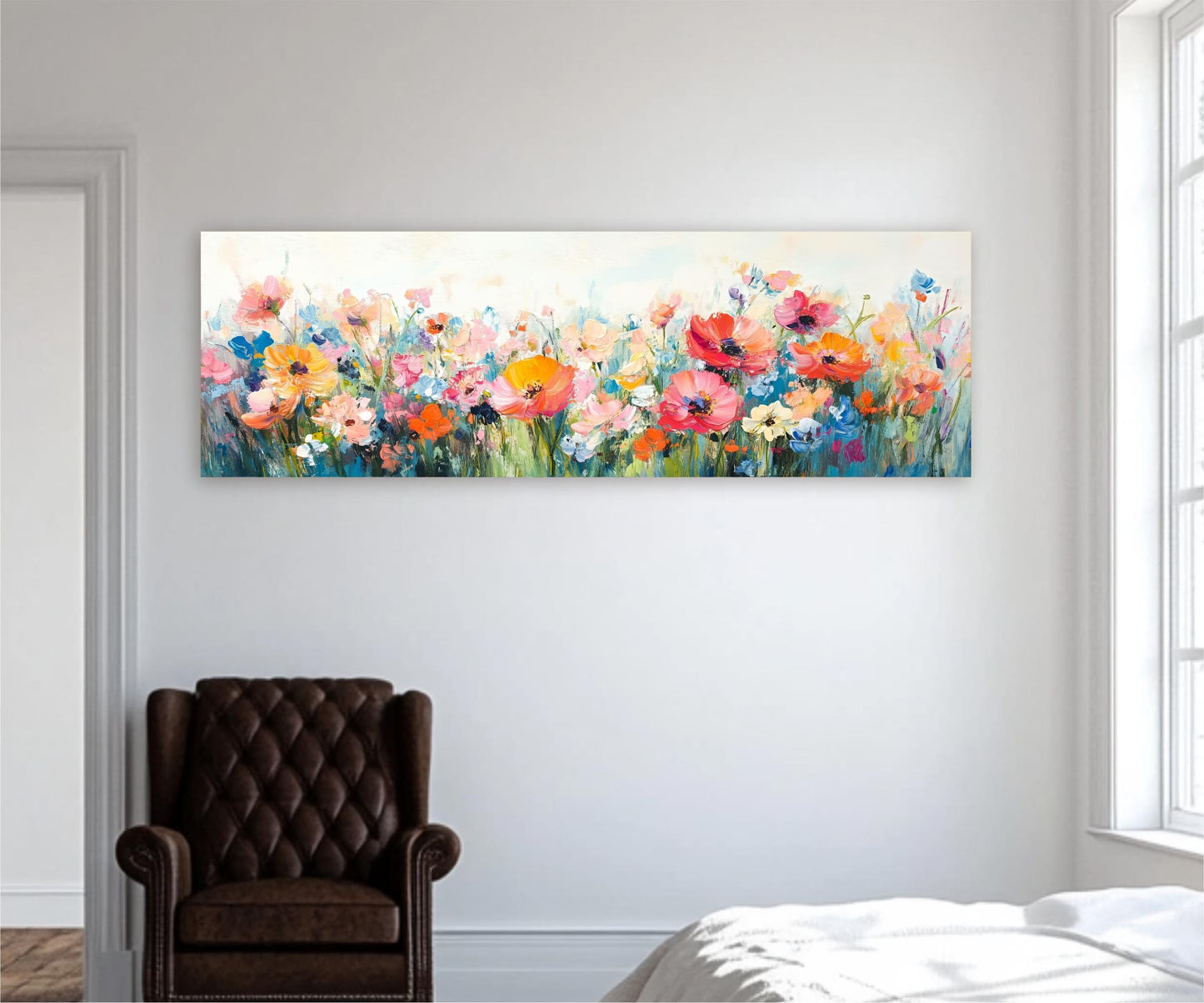 a large, colorful painting of a field of flowers hanging on a white wall in a room.