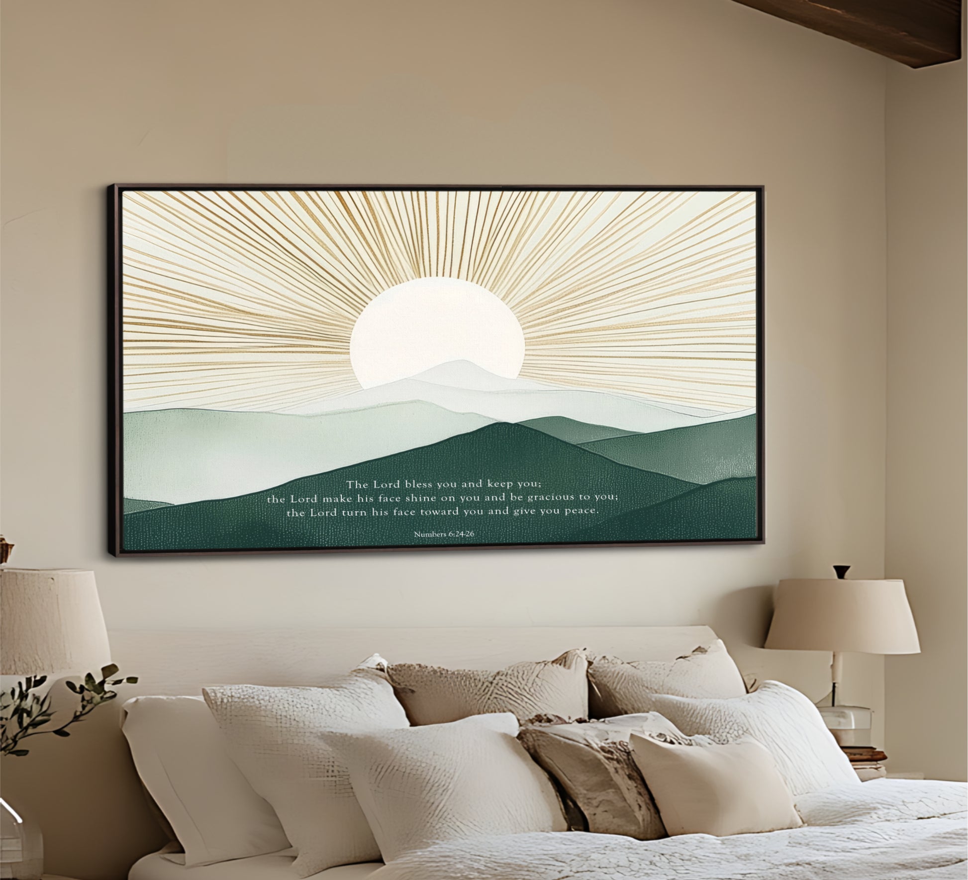 a large framed artwork depicting a serene landscape with a sun rising over mountains, hanging on the wall above a bed with white pillows and a beige headboard.