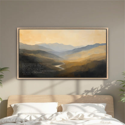 a large landscape painting hanging on a wall above a bed with white pillows.