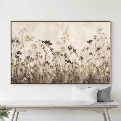 a large painting of a field of flowers hanging on a wall above a wooden bench.