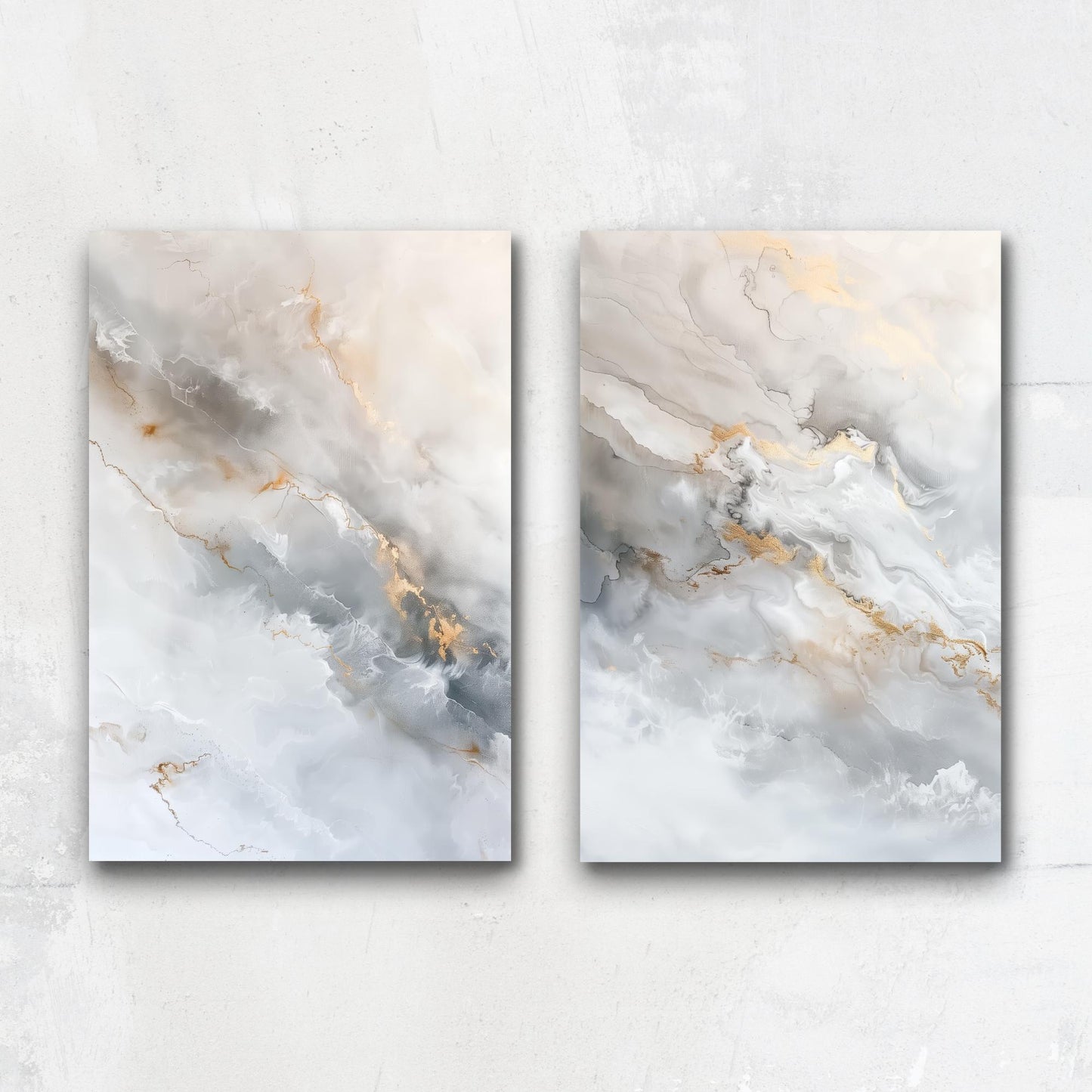 two abstract paintings with a marble-like texture, featuring a blend of white, gray, and gold colors.