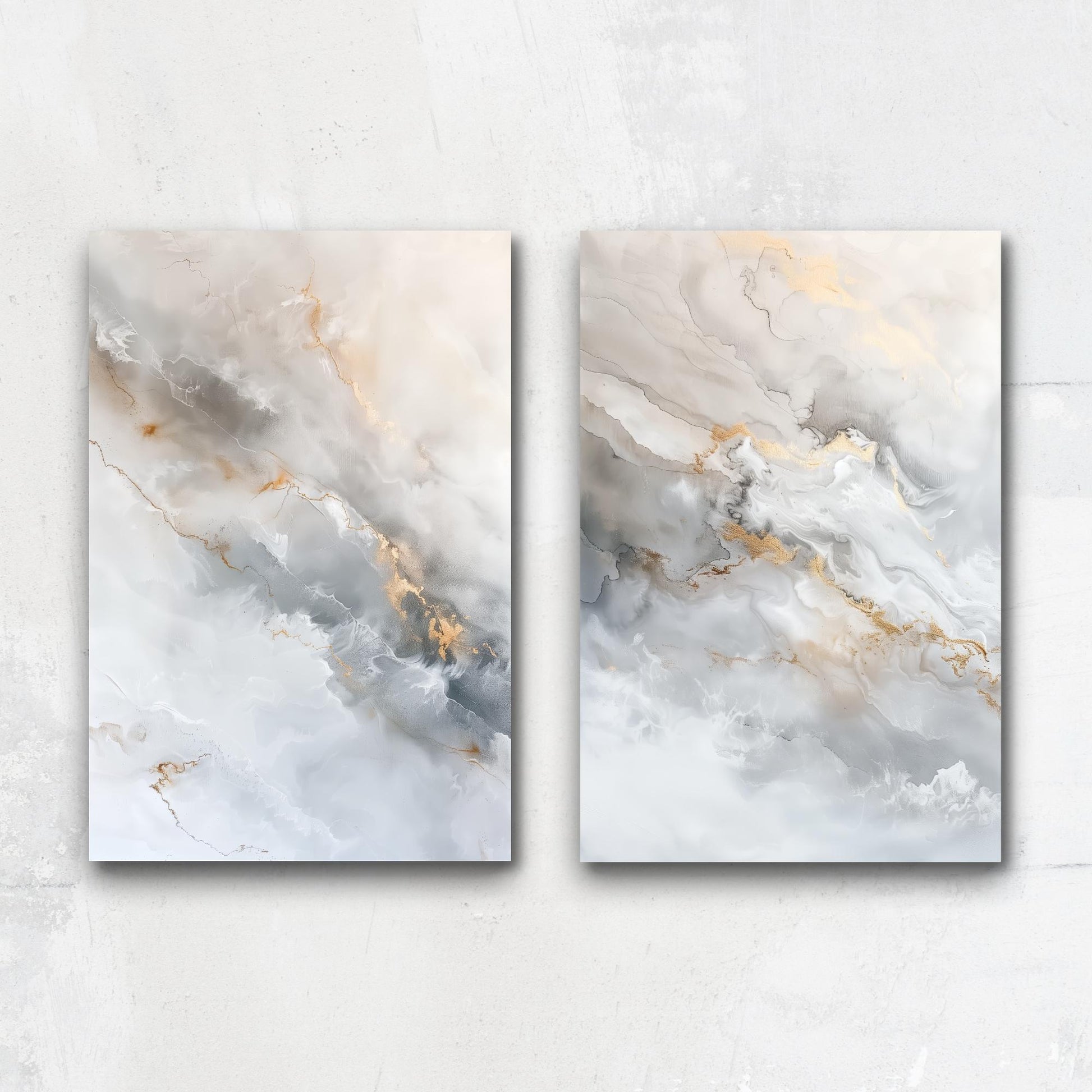 two abstract paintings with a marble-like texture, featuring a blend of white, gray, and gold colors.