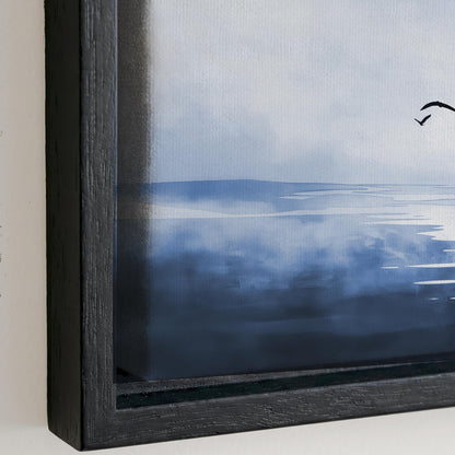 The image is a framed painting depicting a serene landscape with a body of water and a cloudy sky.