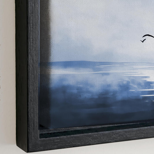 The image is a framed painting depicting a serene landscape with a body of water and a cloudy sky.