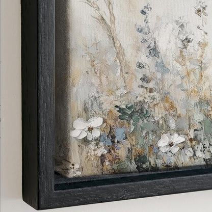 The image is a framed painting depicting a field of flowers with a mix of white and green colors.