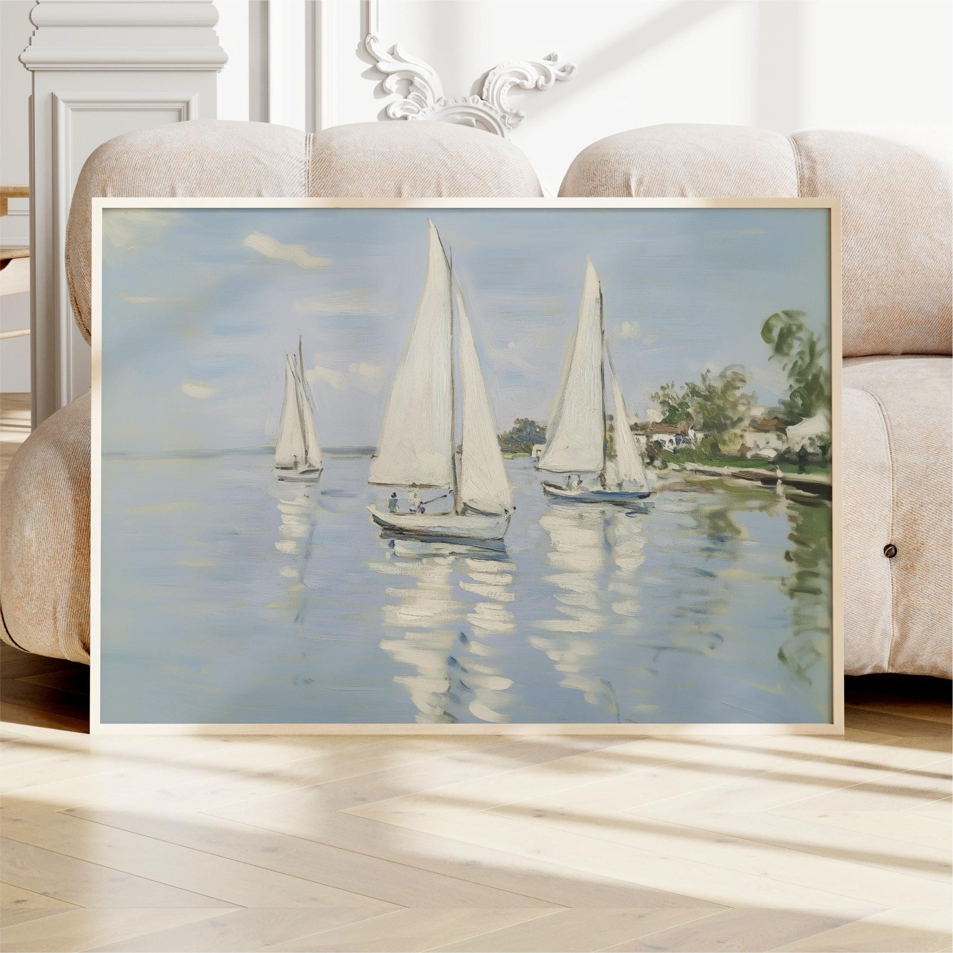 A framed painting depicting three sailboats on a body of water, with a serene and peaceful atmosphere.