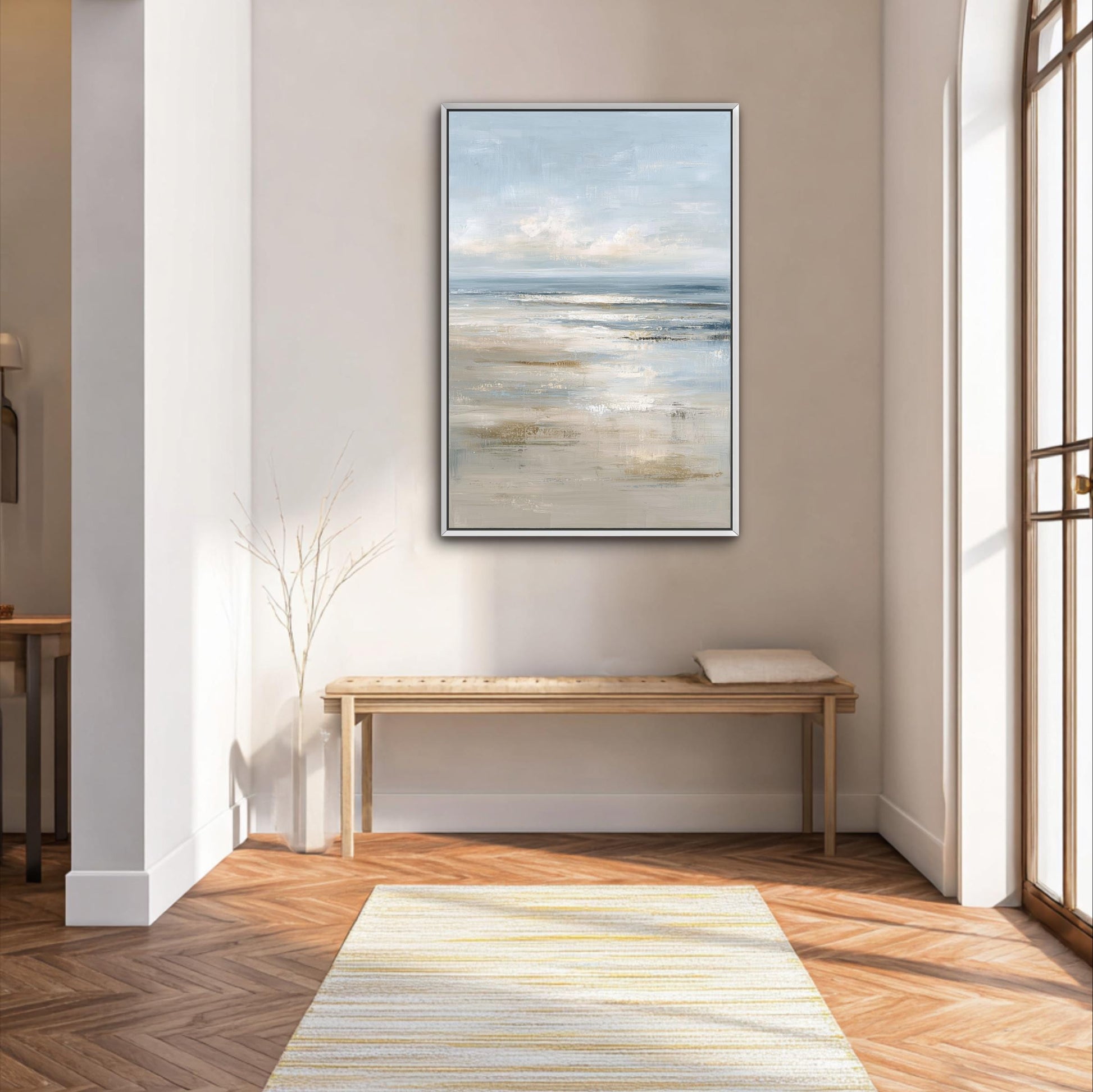 a serene and minimalist interior design with a large painting of a beach scene hanging on the wall above a wooden bench. The painting is framed in a simple white frame, and the wooden bench is positioned in front of the painting, creating a harmonious and visually appealing space.