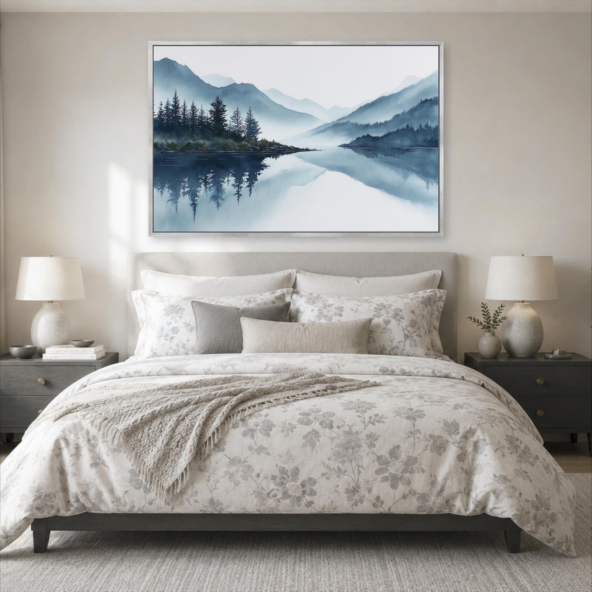 a serene bedroom scene with a large bed, a nightstand on each side, and a framed landscape painting hanging above the bed.