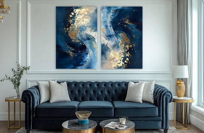 a luxurious living room with a blue velvet sofa, two round coffee tables, and a large abstract painting on the wall above the sofa.