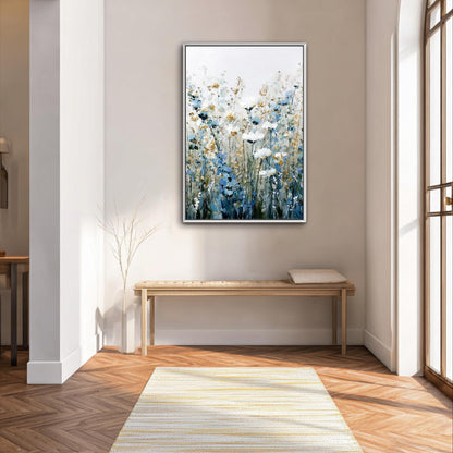a large painting of flowers hanging on a wall in a room with a wooden bench and a rug on the floor.