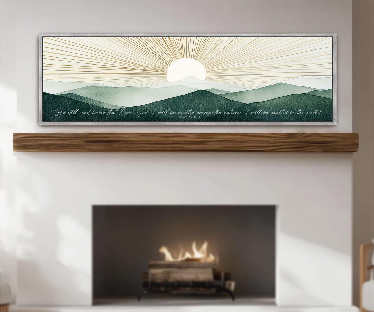 a fireplace with a warm fire burning inside, and above it is a framed artwork depicting a serene landscape with mountains and a sun in the sky.