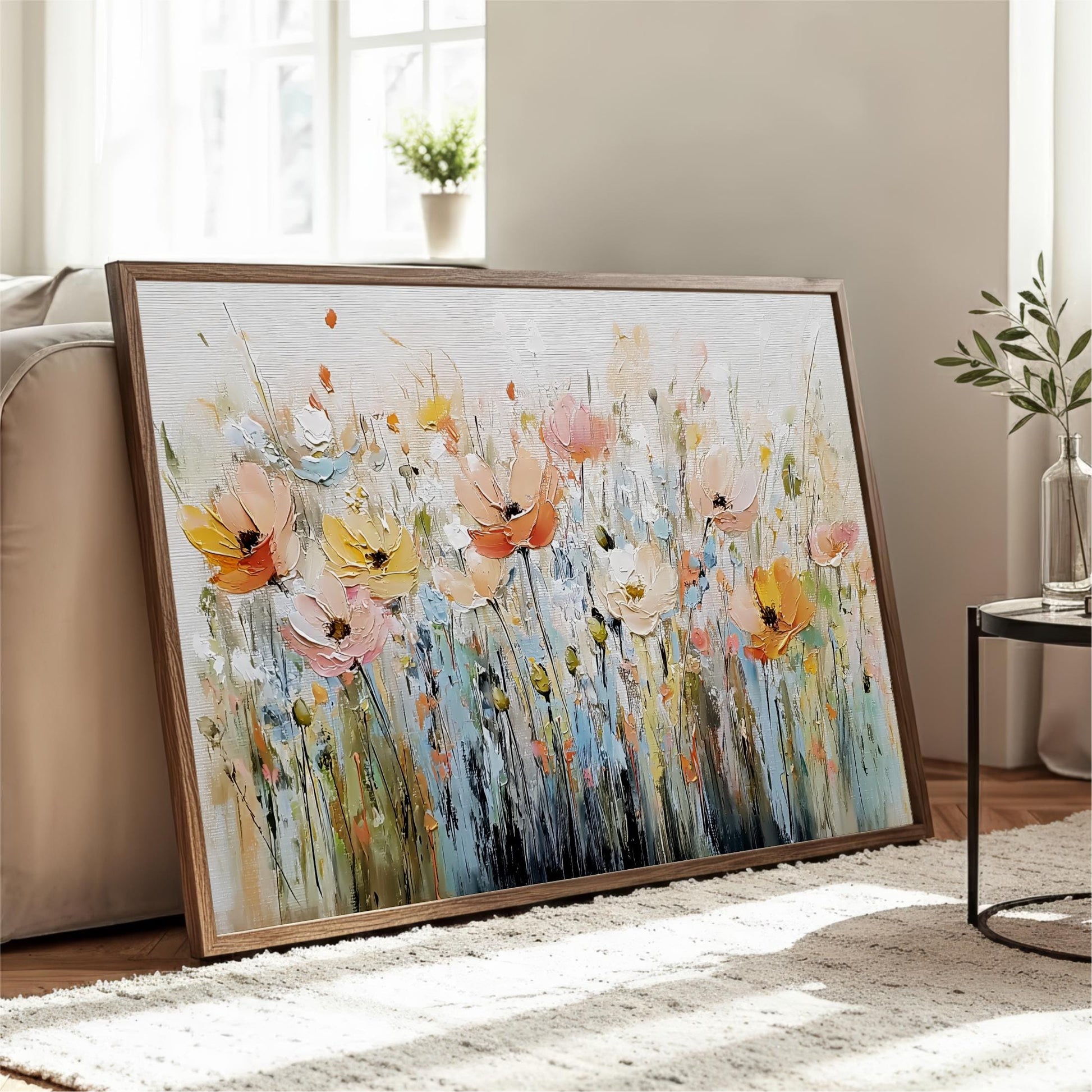 a large, framed painting of colorful flowers on a wooden frame, displayed on a white rug in a living room setting.