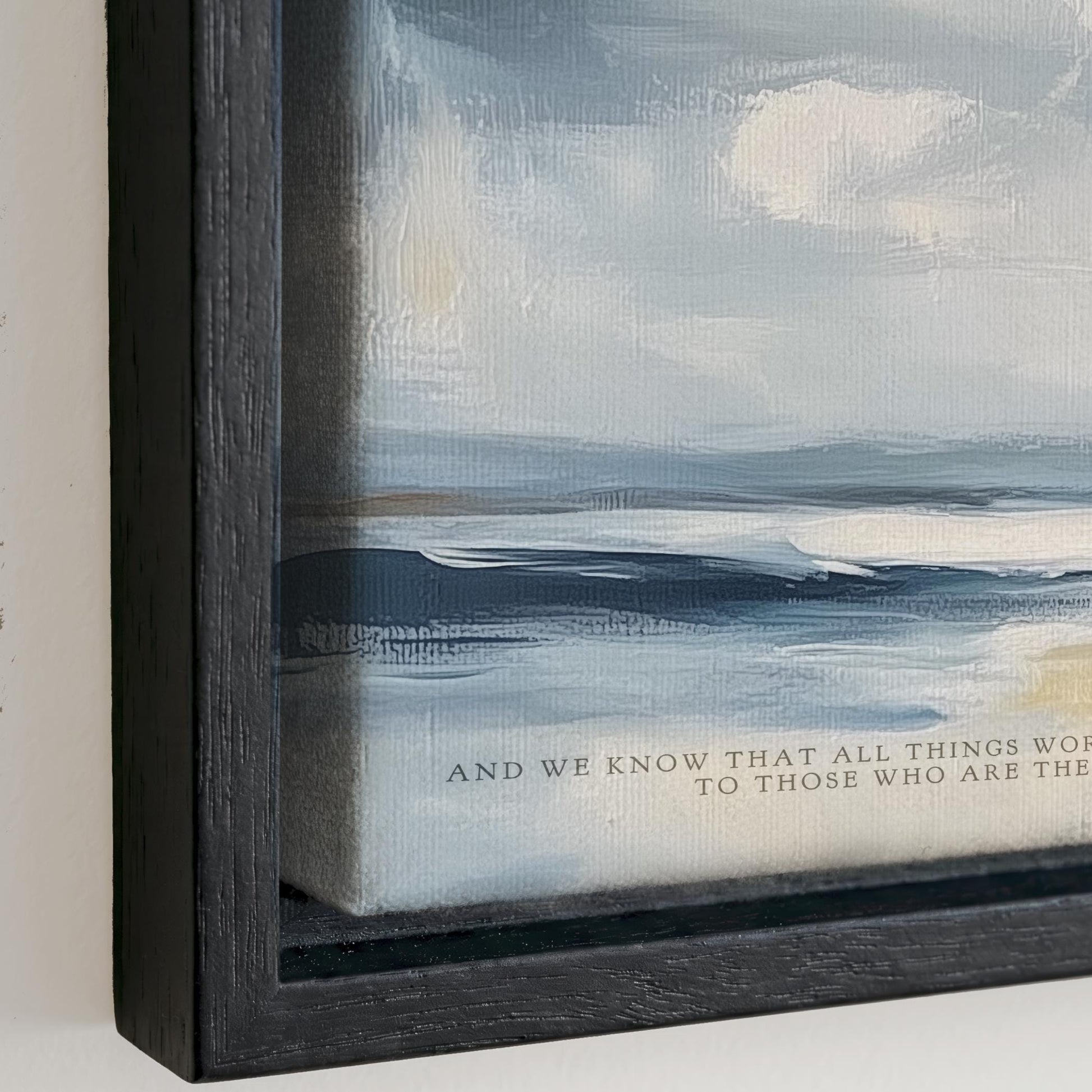 The image is a framed painting depicting a serene landscape with a body of water and a cloudy sky.