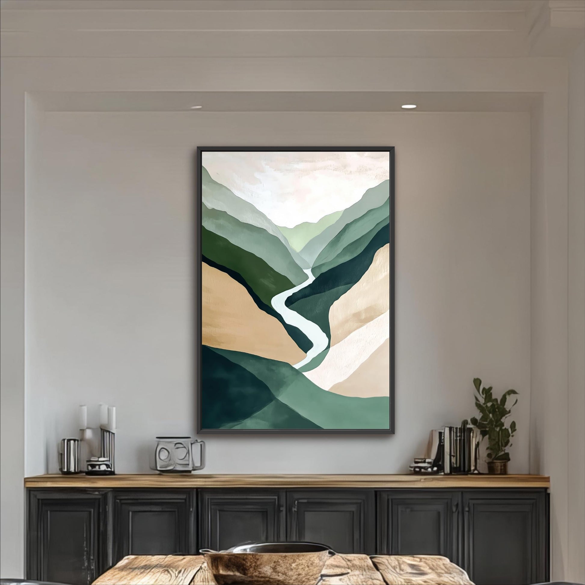 a large abstract painting hanging on a wall above a wooden table with a bowl on it.
