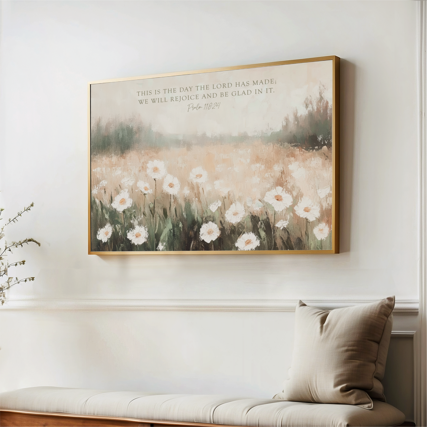 a painting of a field of white flowers hanging on a wall, with a quote from the Bible above it.