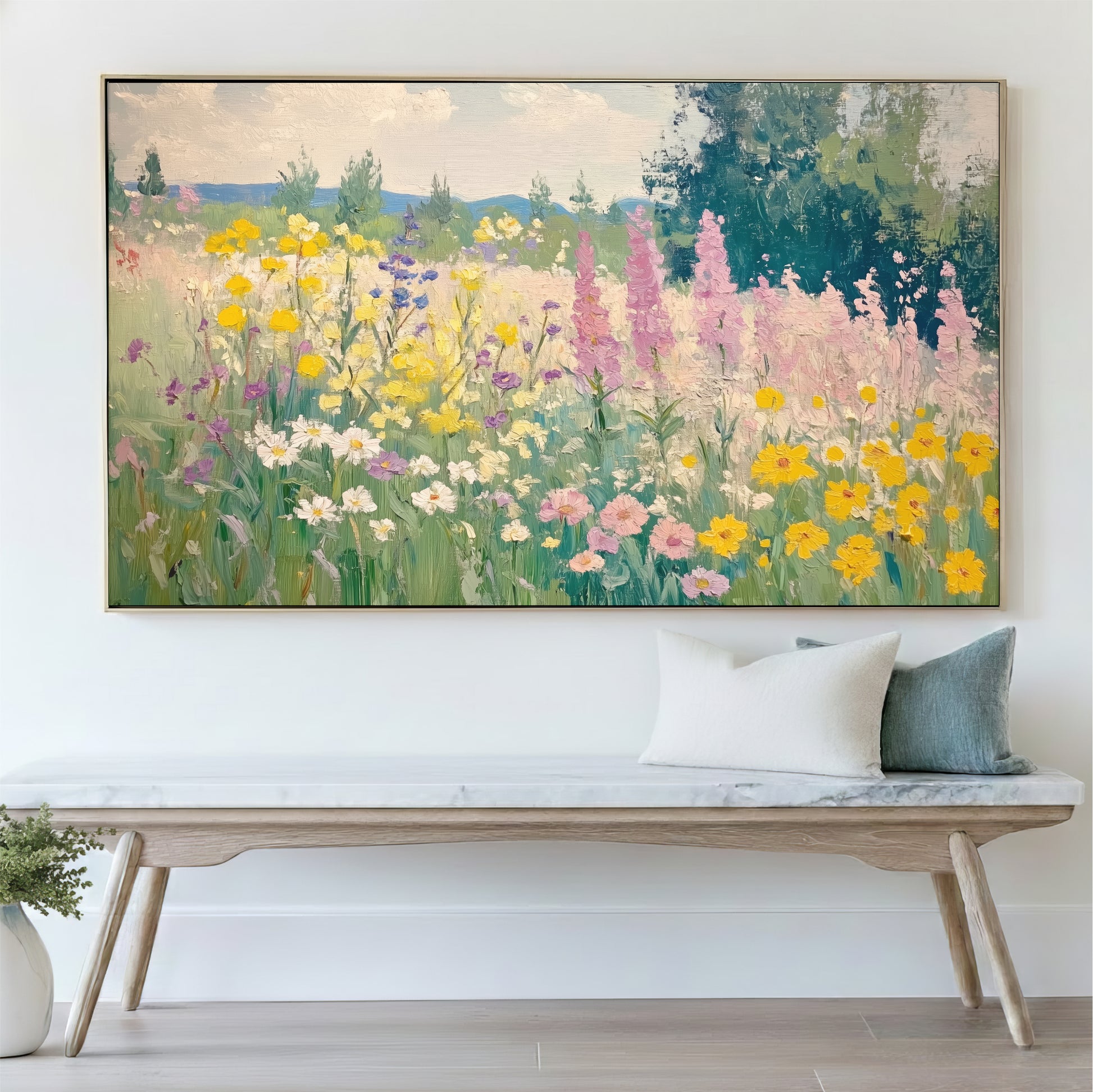 a large painting of a colorful garden with various flowers and plants hanging on a wall above a wooden bench.