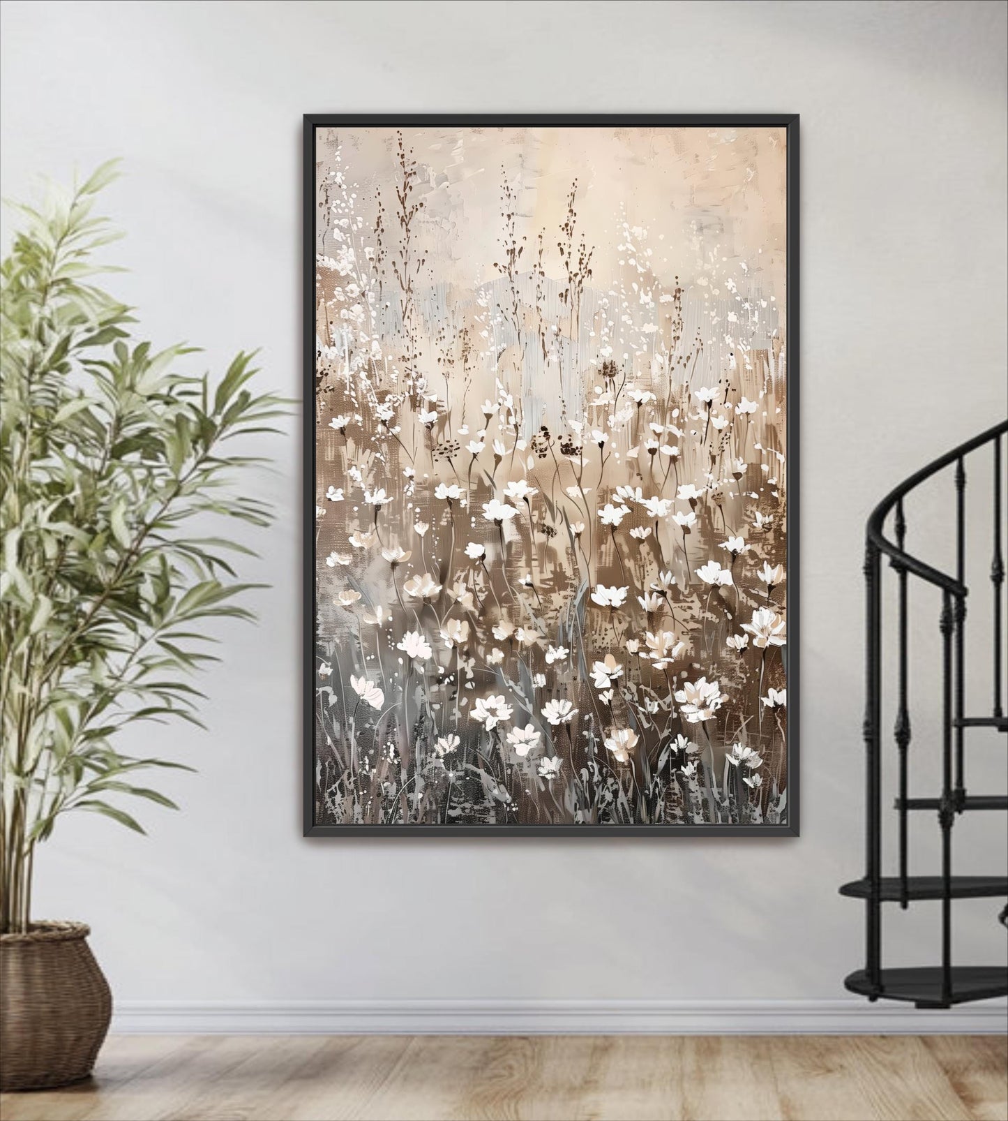 a large framed painting of a field of flowers hanging on a wall, with a potted plant to the left of the painting.