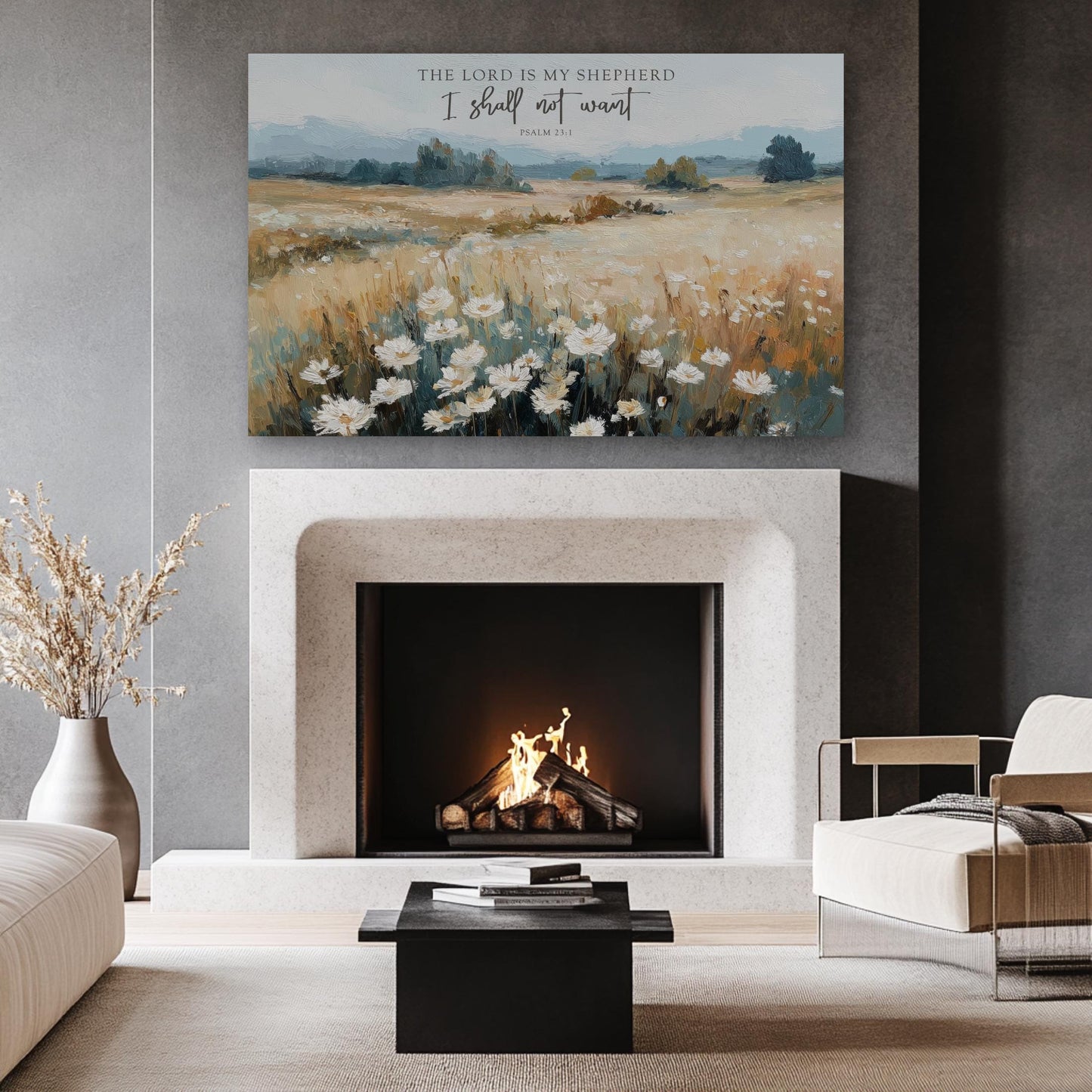 a cozy living room with a fireplace, a coffee table, and a painting of a field of flowers above it. The painting is titled "The Lord is my shepherd" and includes a Bible verse from Psalm 23.
