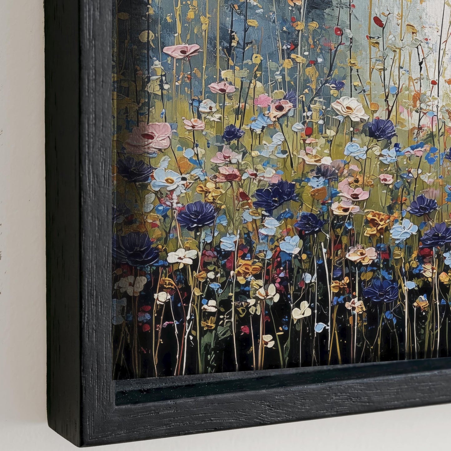 The image is a framed painting depicting a vibrant field of colorful flowers, including various shades of pink, blue, yellow, and purple.