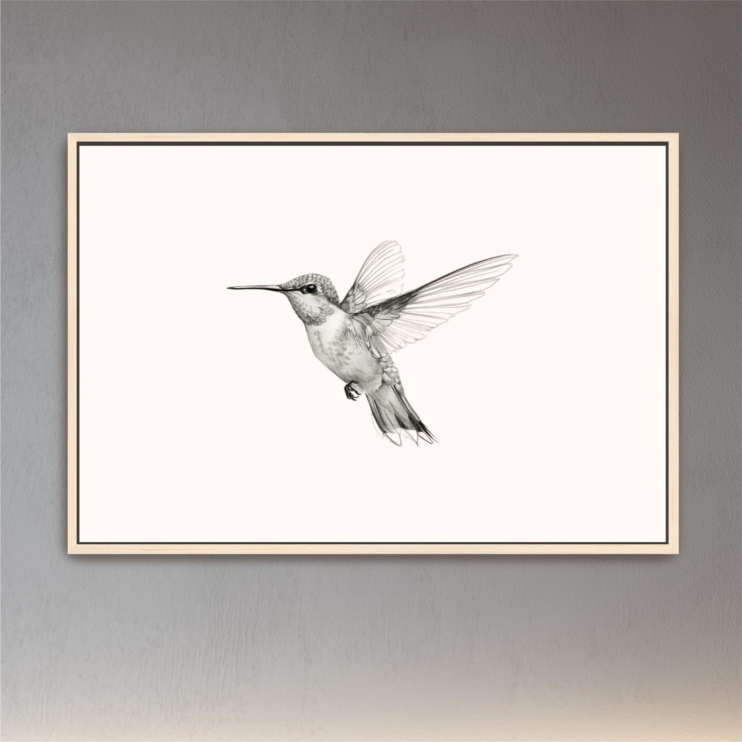 a black and white photo of a hummingbird in flight