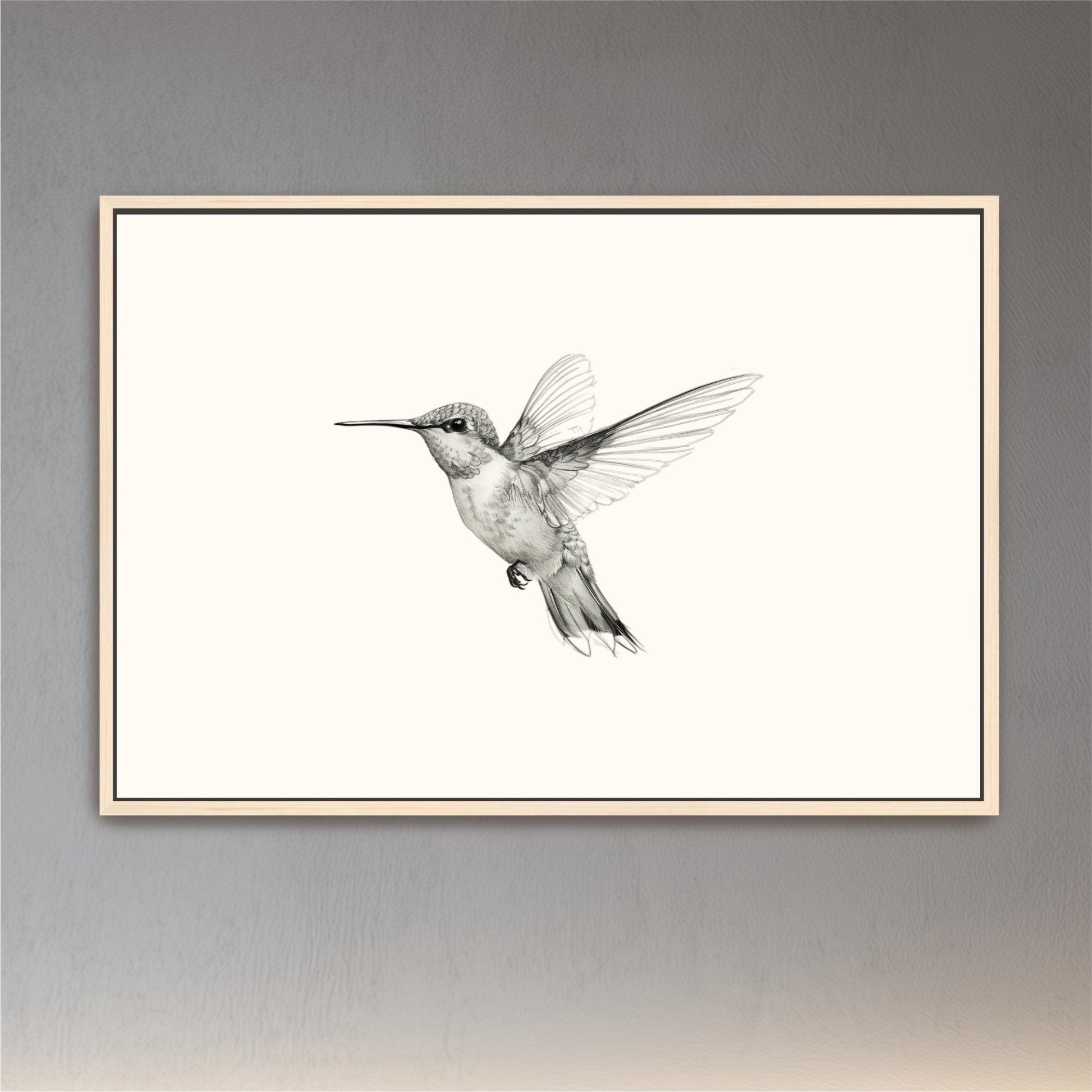 a black and white photo of a hummingbird in flight