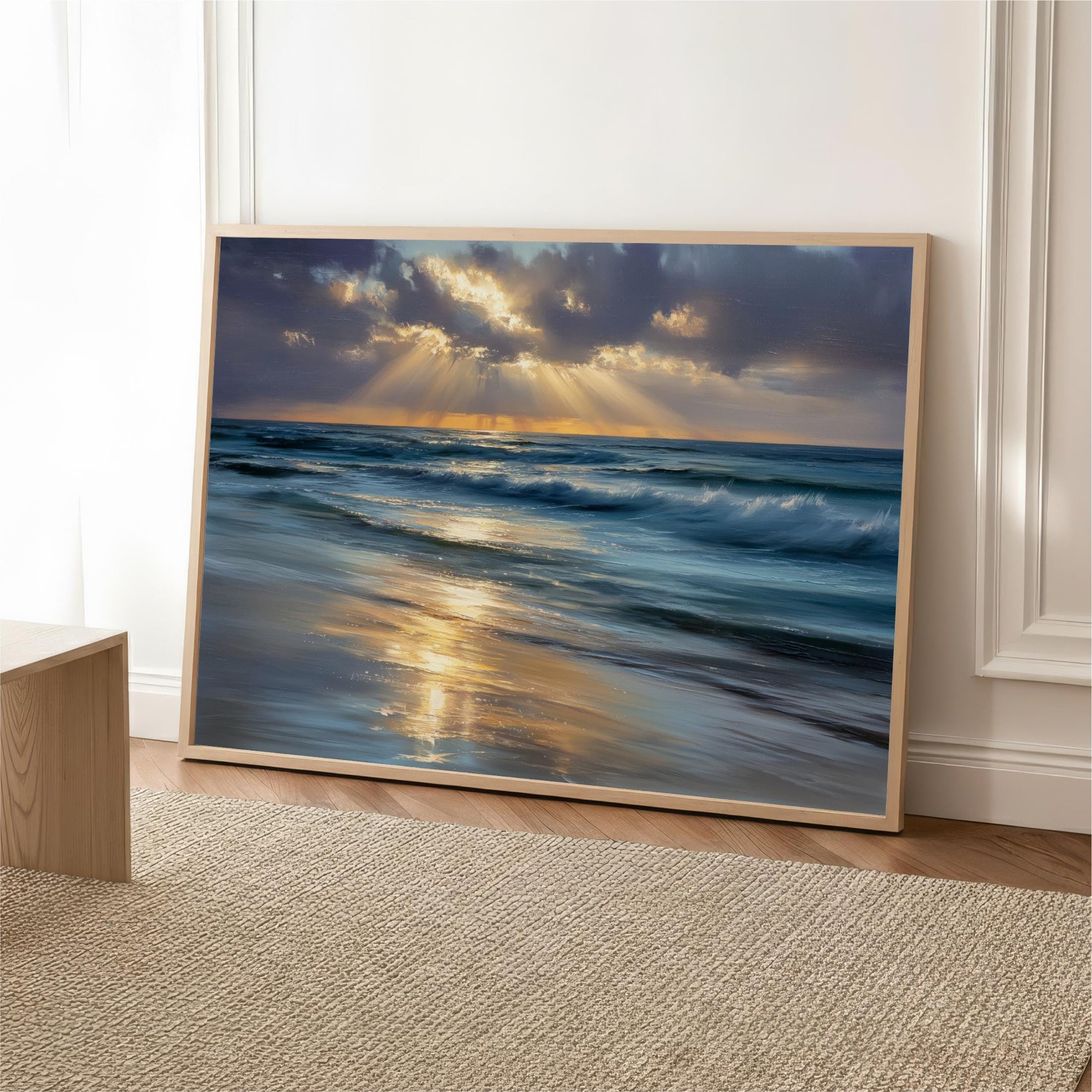 A framed painting depicting a serene ocean scene with a sunset over the water, creating a tranquil atmosphere.