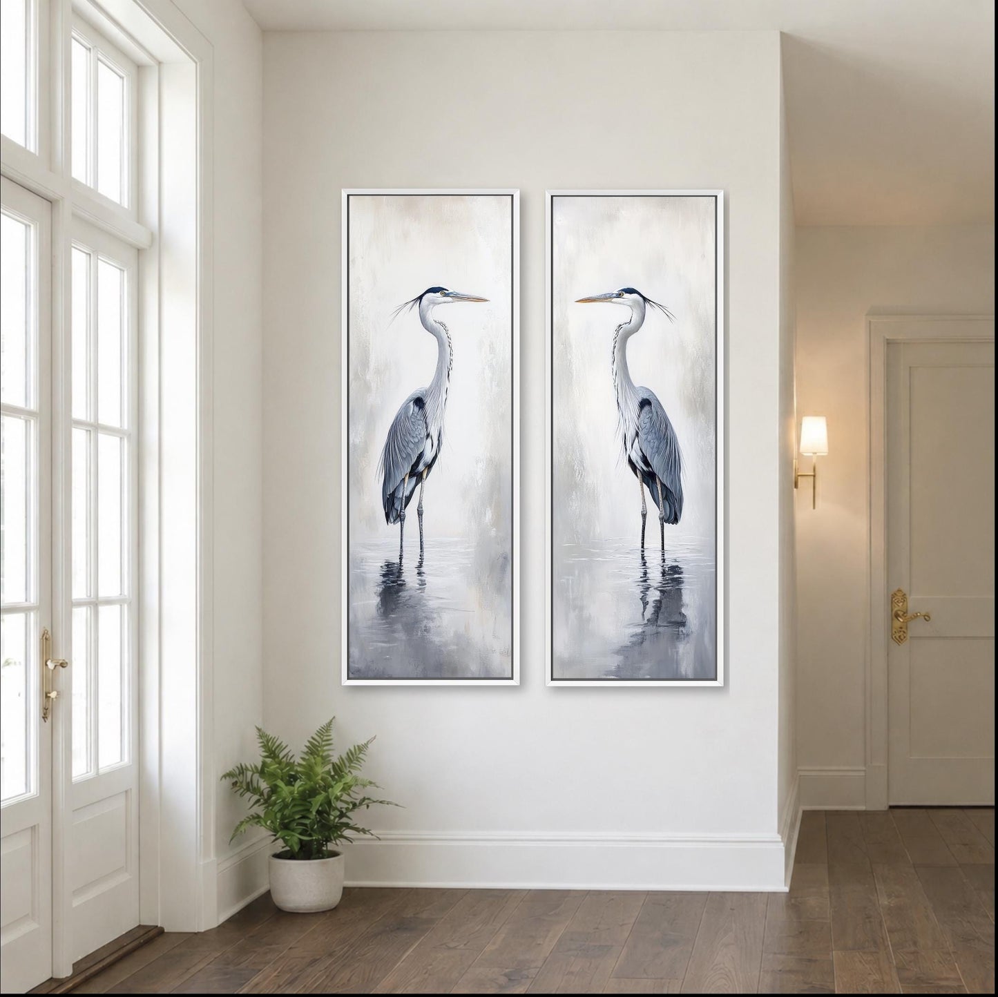 two large paintings of a tall bird, possibly a crane or heron, displayed on a white wall in a room with a wooden floor.