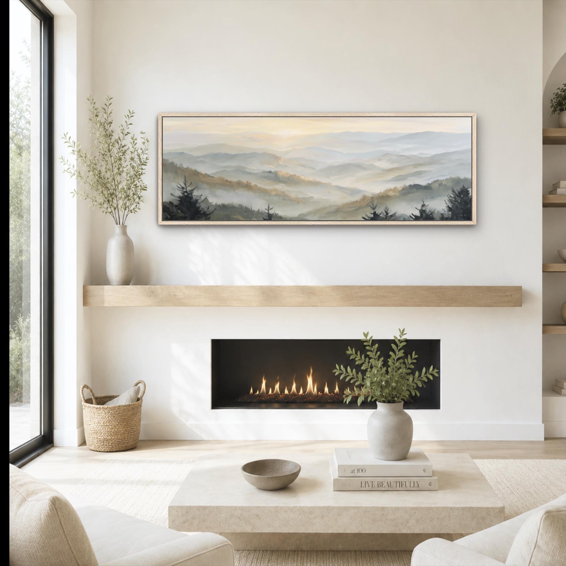 a cozy living room with a fireplace, a coffee table, and a painting of a mountain landscape hanging on the wall above the fireplace.