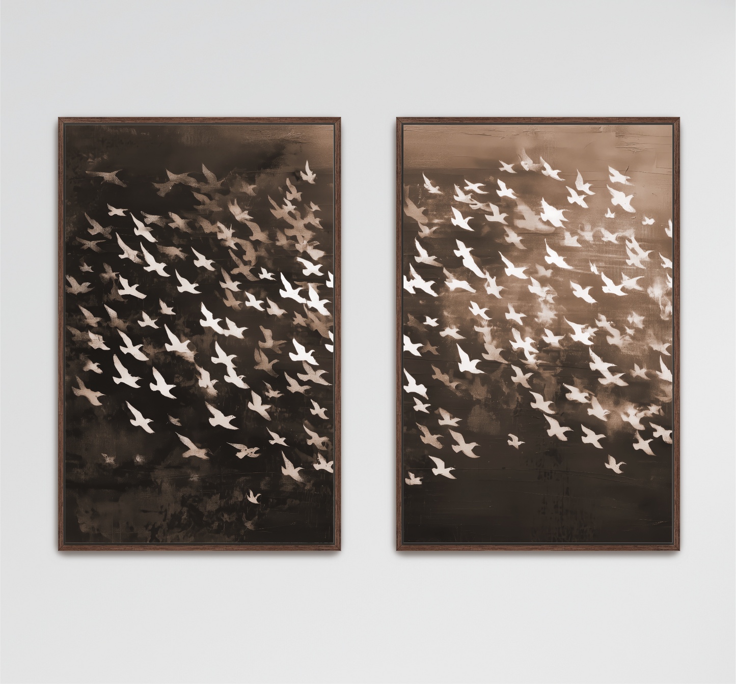 a pair of framed artworks depicting a flock of birds in flight.