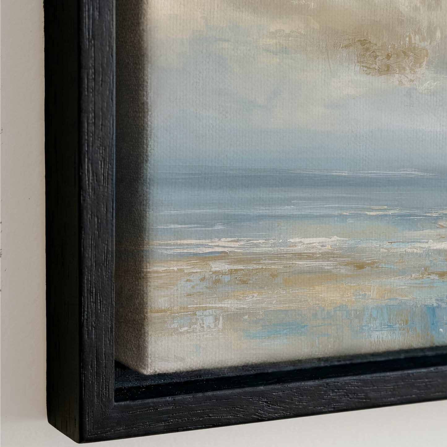 The image is a framed painting depicting a serene landscape with a calm body of water and a cloudy sky.