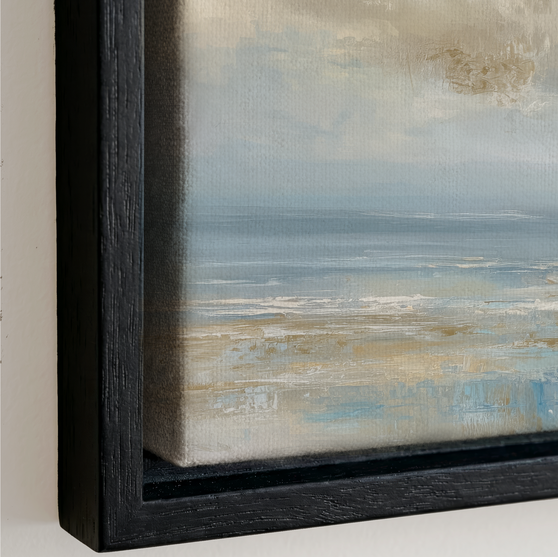 The image is a framed painting depicting a serene landscape with a calm body of water and a cloudy sky.