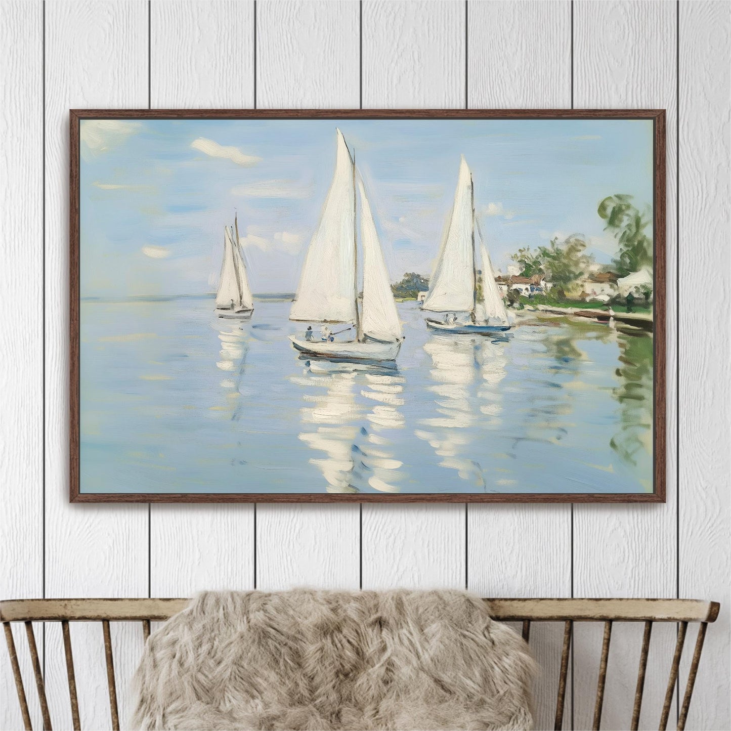 The image is a framed painting depicting three sailboats on a body of water, with a wooden fence and trees in the background.