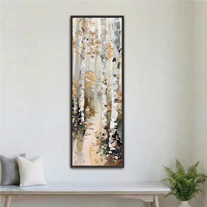 a large, framed painting of a forest scene hanging on a white wall.