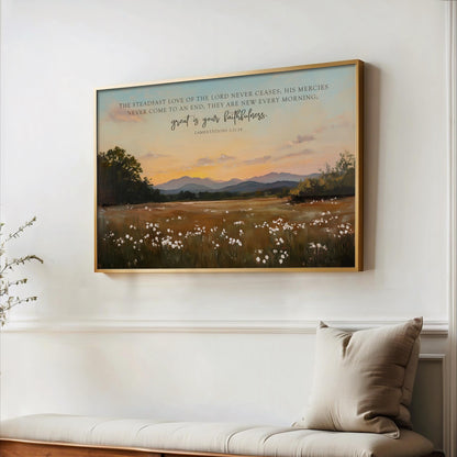 a serene landscape with a field of flowers and mountains in the background, framed by a wooden border.