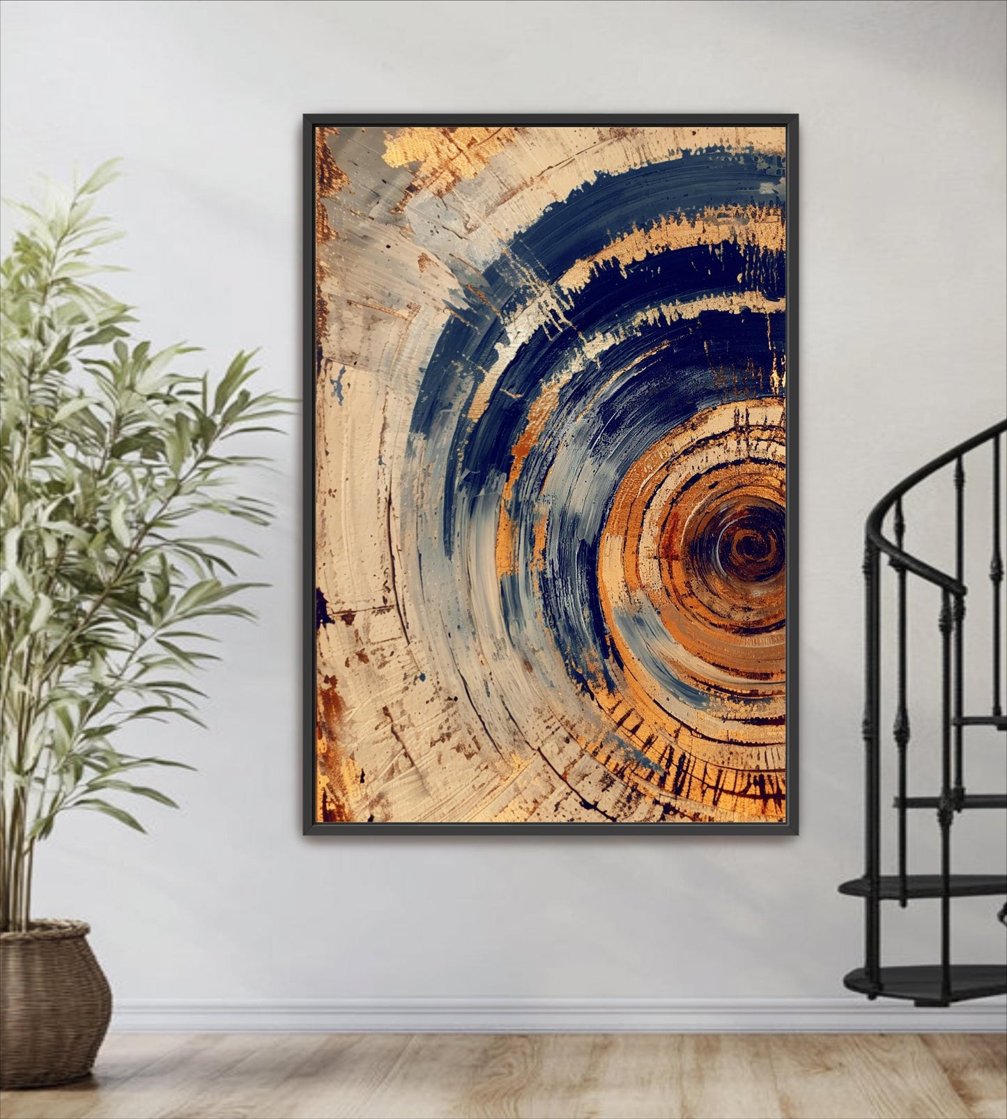 a large abstract painting hanging on a wall, with a black metal spiral staircase visible to the right.