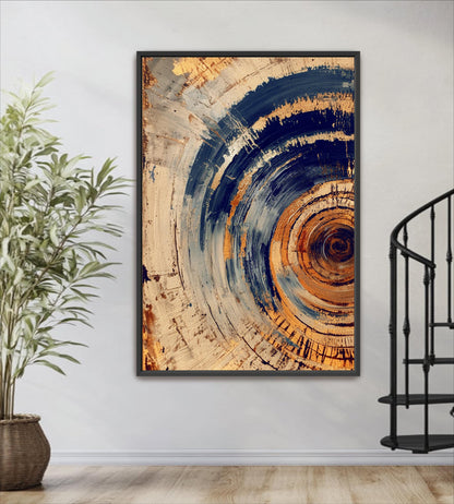a large abstract painting hanging on a wall, with a black metal spiral staircase visible to the right.