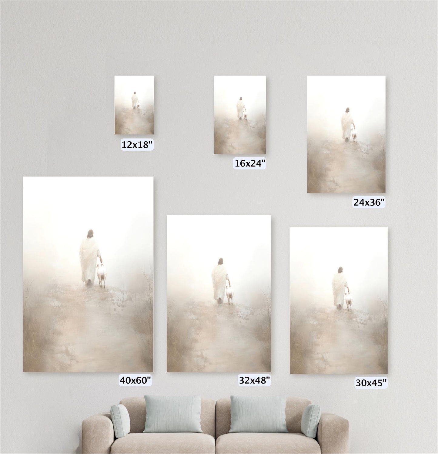 a living room with a couch and three pictures on the wall