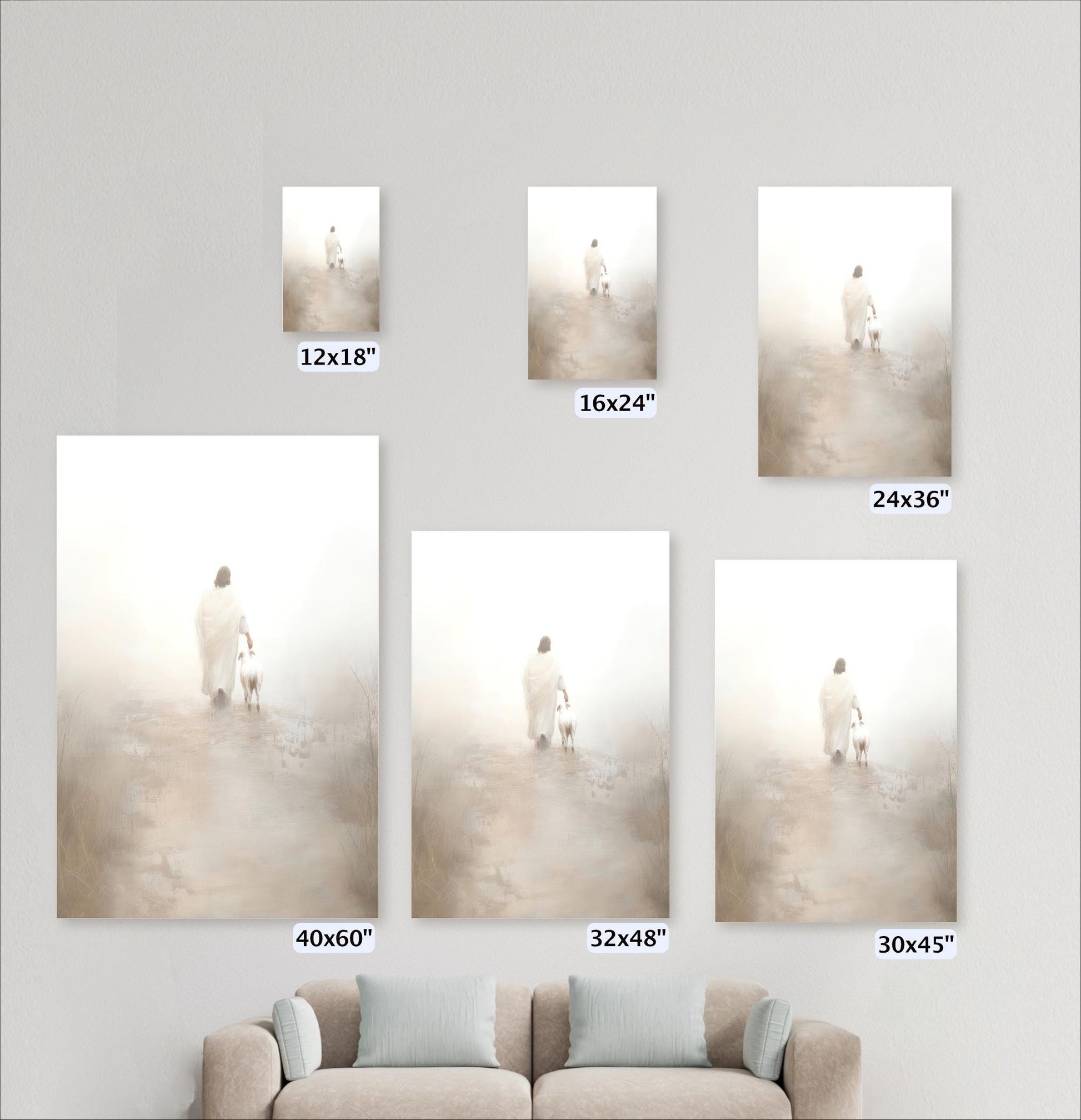 a living room with a couch and three pictures on the wall