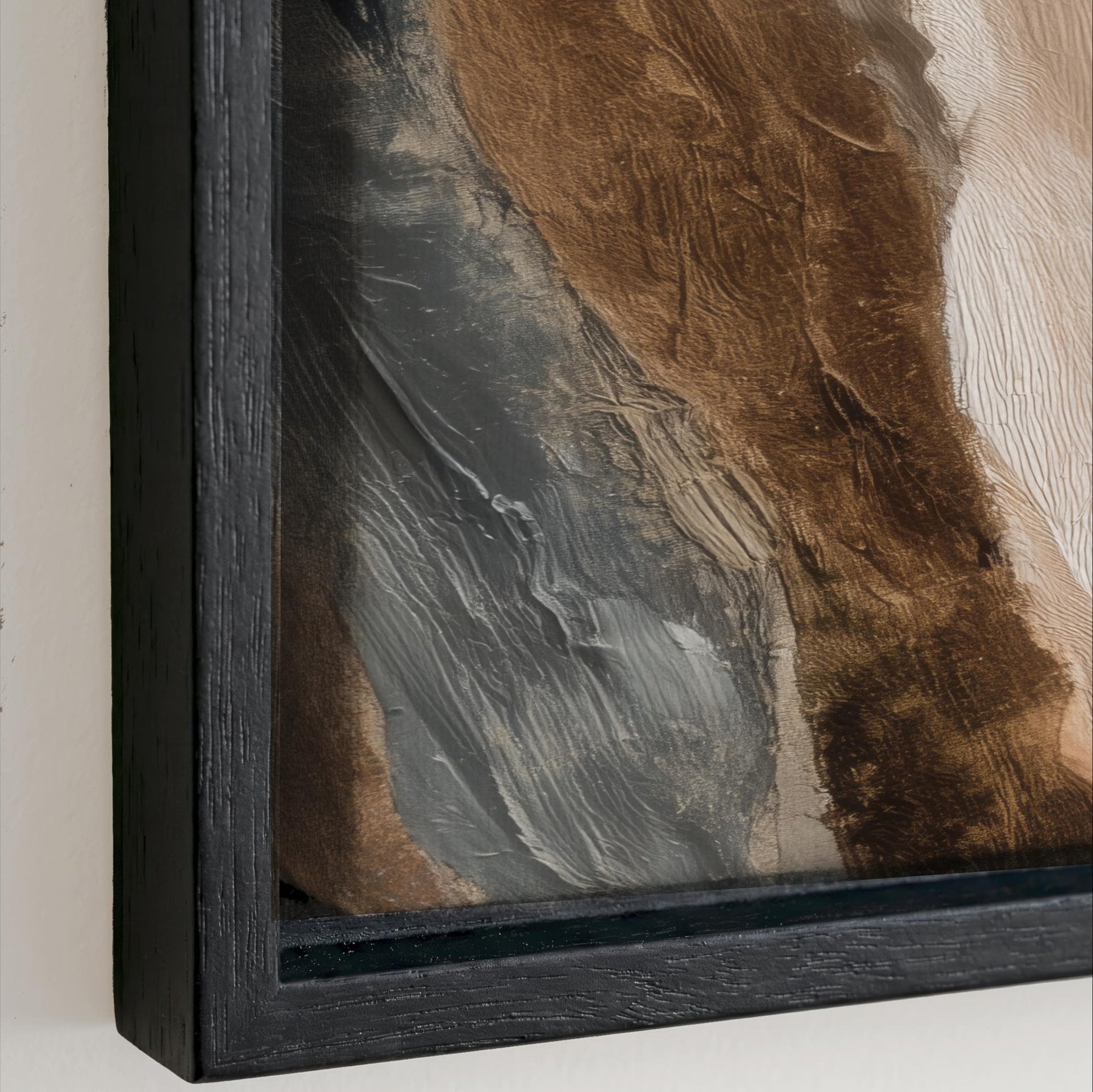 The image is a close-up of a framed artwork with a textured brown and gray background.