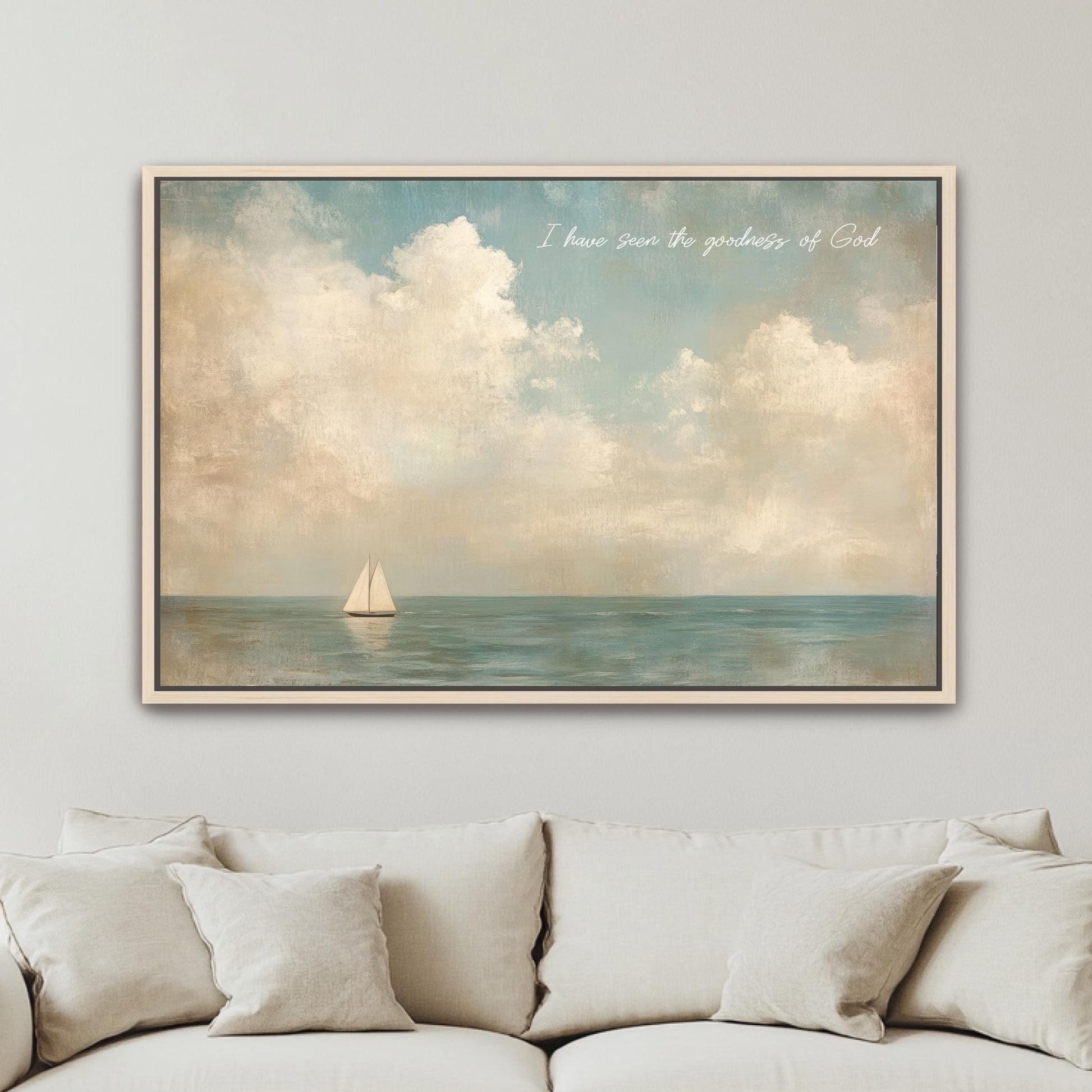 a serene scene of a sailboat on the ocean, with a cloudy sky above.