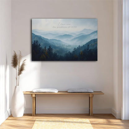 a serene mountain landscape with a wooden bench and a potted plant in the foreground. Above the bench, there is a framed painting depicting a misty mountain range.