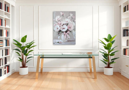 a room with a table, bookshelves and a painting on the wall