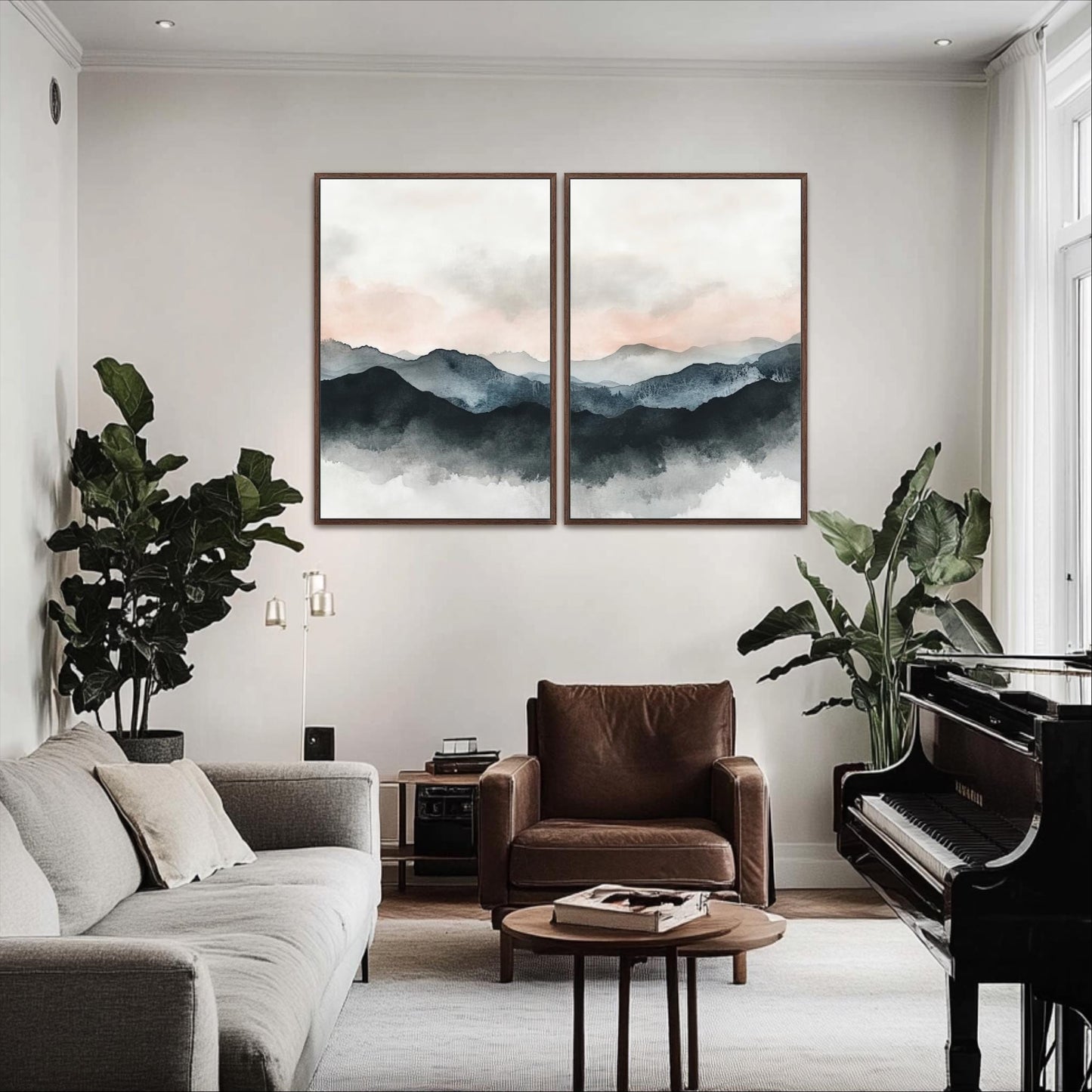 a modern living room with a gray sofa, a brown leather armchair, a piano, and two large paintings of mountains hanging on the wall.