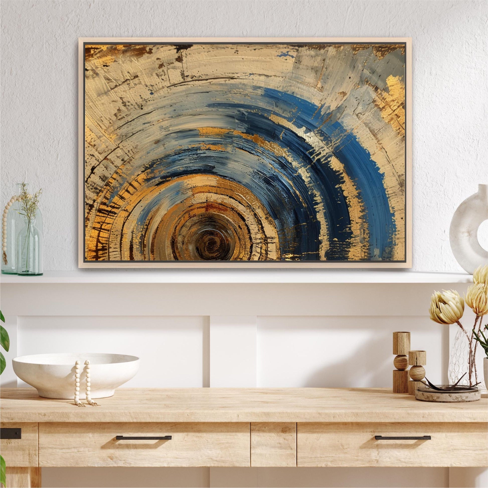 a painting hanging on a wall above a table