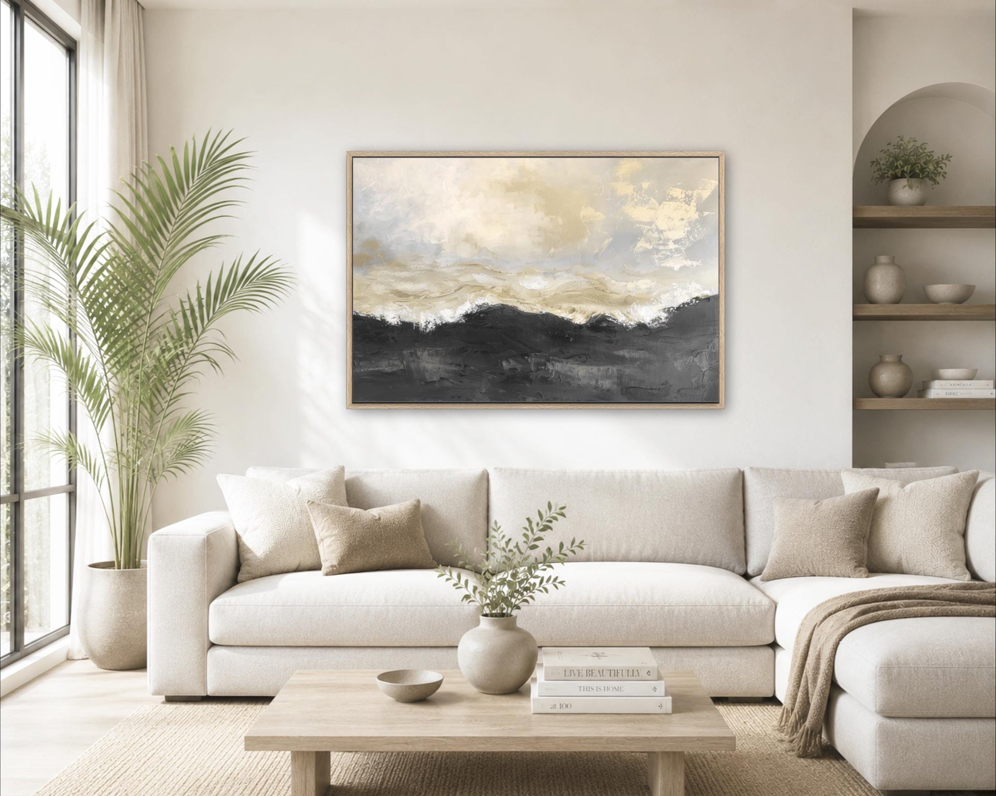 a modern living room with a large white sectional sofa, a wooden coffee table, and a framed abstract landscape painting on the wall.