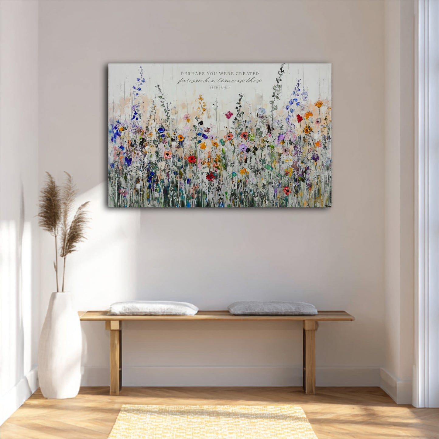 a large, colorful painting of a field of flowers hanging on a wall above a wooden bench.