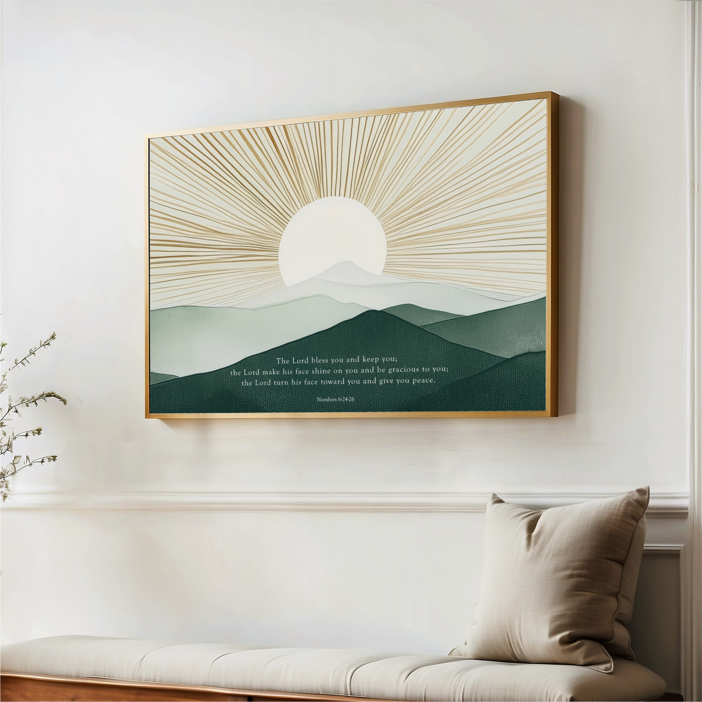 a large framed artwork depicting a serene landscape with a sun rising over a mountain range, hanging on a white wall above a wooden bench.